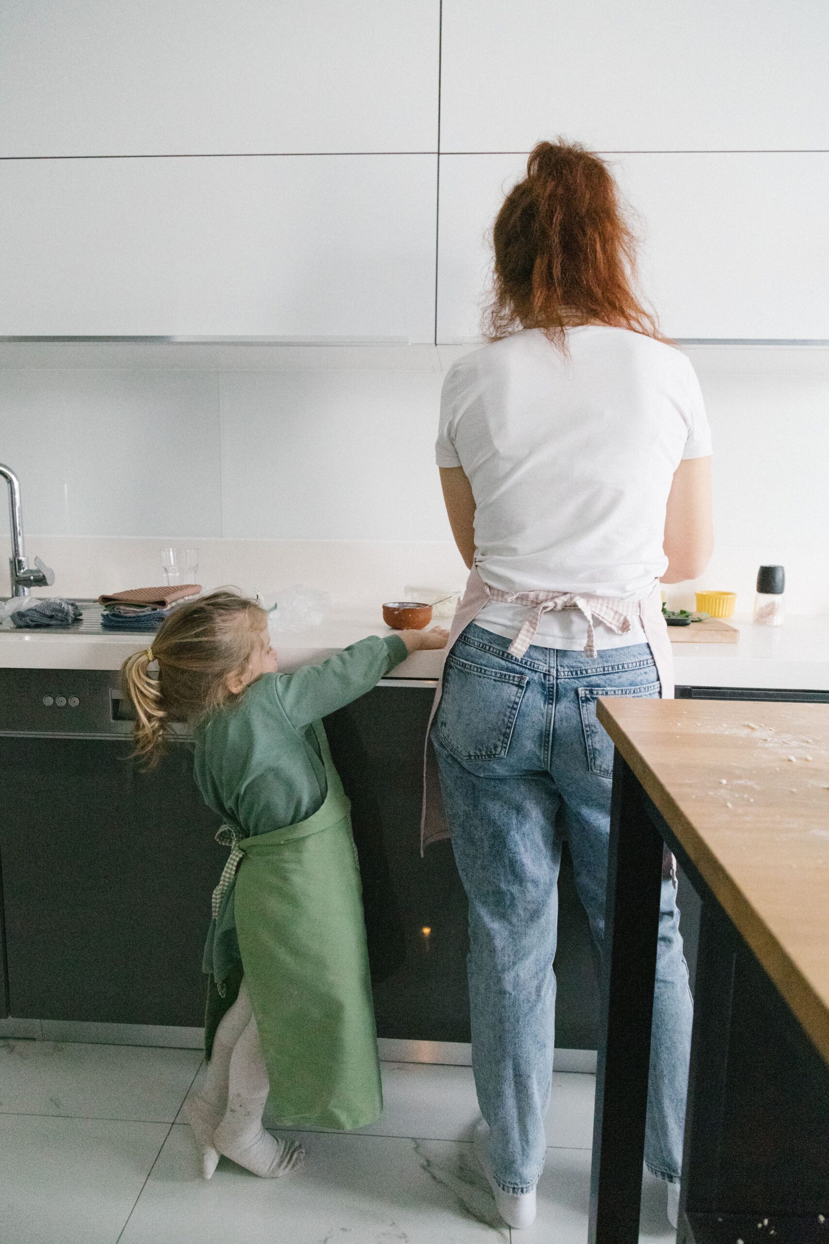 Adult child and aging parent reviewing an existing long-term care insurance policy together